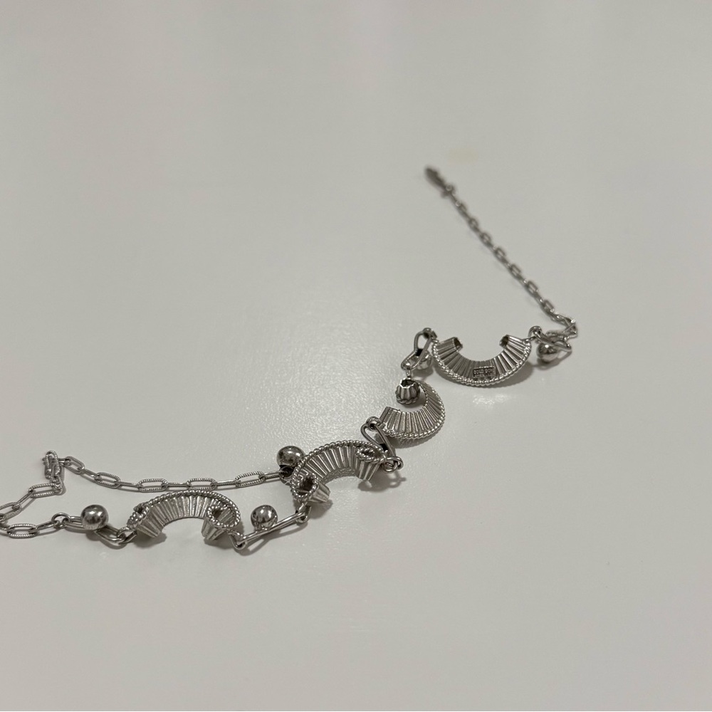 Minimalist Silver Necklace with Curved Design